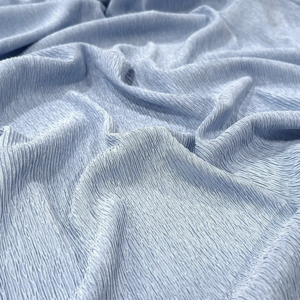 Bella Crepe Table Linen in Baby Blue