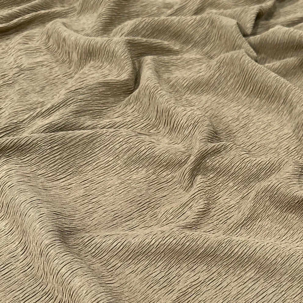 Bella Crepe Table Linen in Taupe