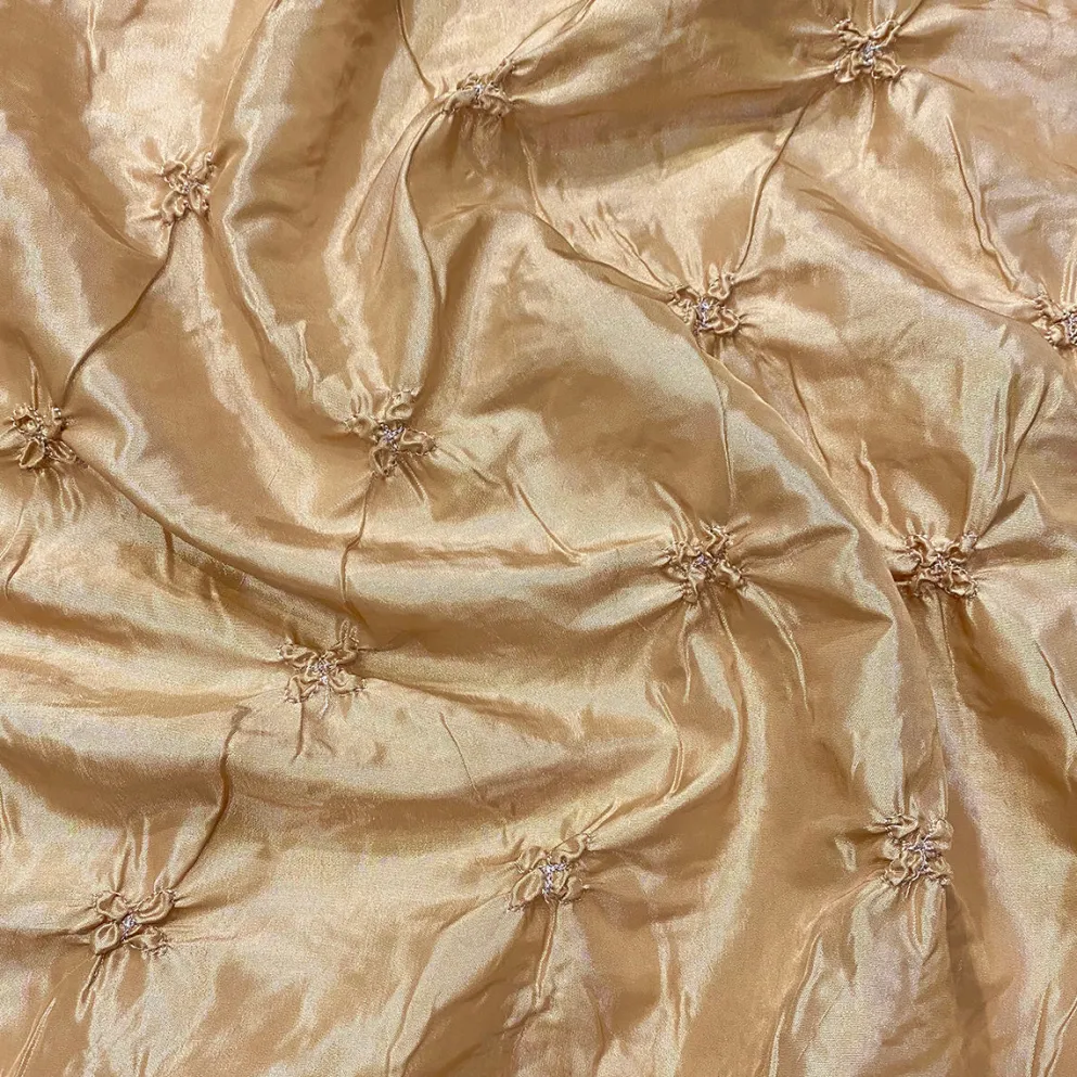 Belly Button (Pinwheel) Table Linen in Gold