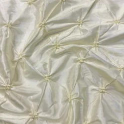 Belly Button (Pinwheel) Table Linen in Ivory