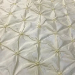 Belly Button (Pinwheel) Table Linen in Ivory