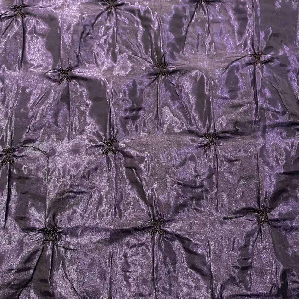 Belly Button (Pinwheel) Table Linen in Raisin