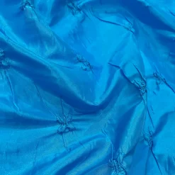 Belly Button (Pinwheel) Table Linen in Turquoise