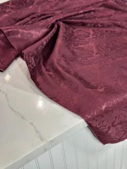 Damask Poly Table Linen in Burgundy