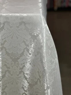 Damask Poly Table Linen in Ivory