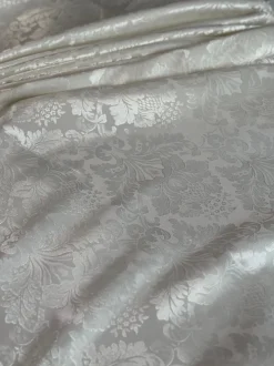 Damask Poly Table Linen in Ivory