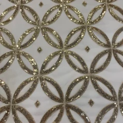 Delano Sequins Table Linen in Champagne