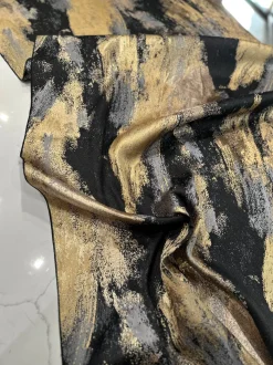 Element Jacquard Table Linen in Black and Gold