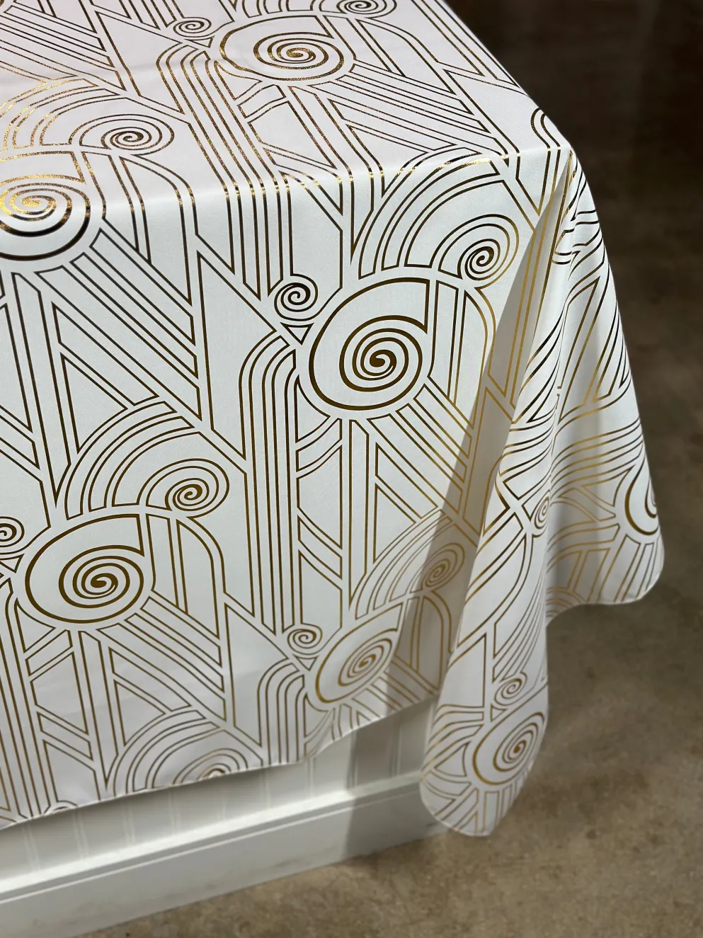 Luxor (Metallic Print) Table Linen in White and Gold