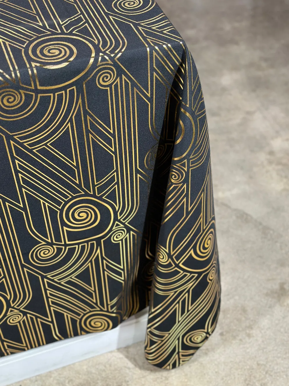 Luxor (Metallic Print) Table Linen in Black and Gold