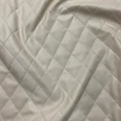 Murano Quilt Table Linen in Taupe